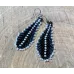 Boucles d'oreilles plumes en perles