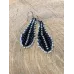 Boucles d'oreilles plumes en perles
