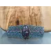 Bracelet macramé baroque et Eudialite sertie