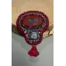 Broche rouge et perles de verre