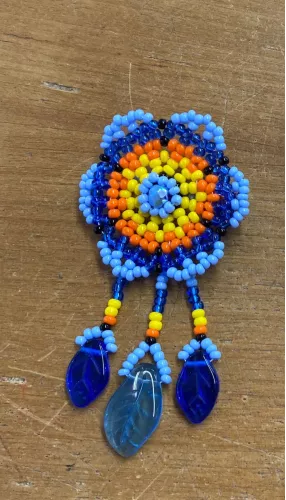 Broche fleur bleue