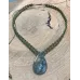 Collier macramé et Labradorite reflets verts dorés Collier macramé et Labradorite reflets verts dorés