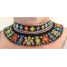 Collier perles motifs géométriques multicolores Collier perles motifs géométriques multicolores