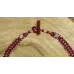 Collier mi long plume rubis Collier mi long plume rubis